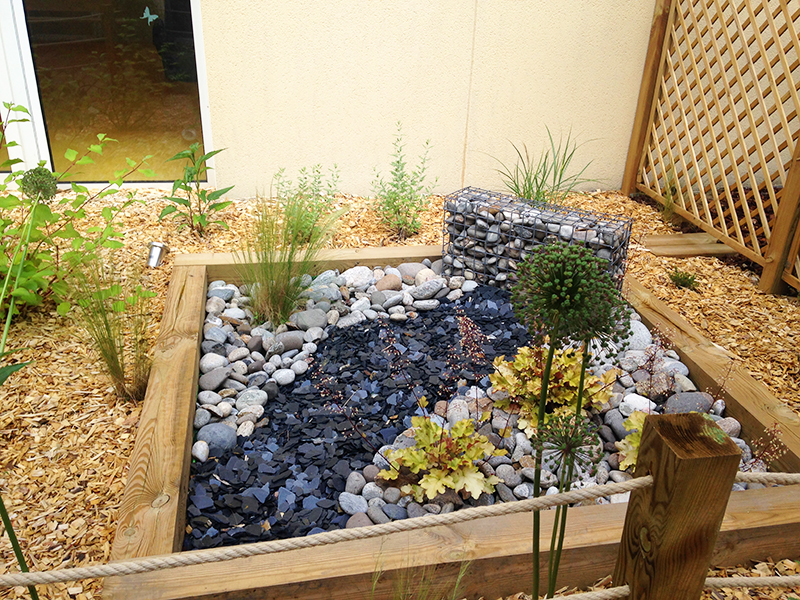 Des roches qui symbolisent une fontaine